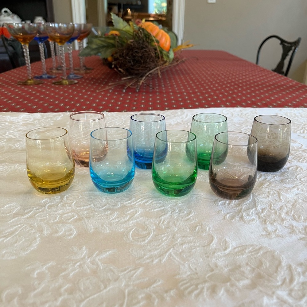 Vintage colored glass shot glasses.
